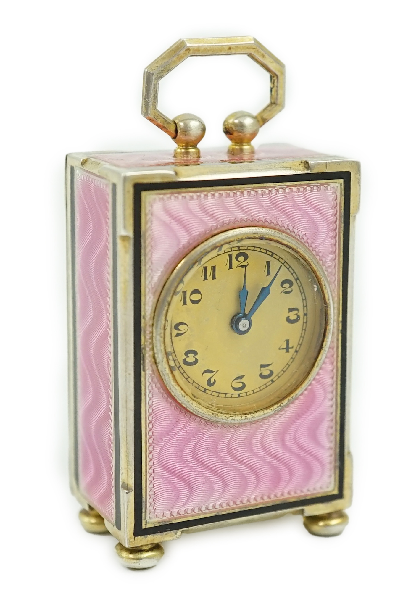 An early 20th century Swiss silver gilt and two colour enamel miniature carriage timepiece